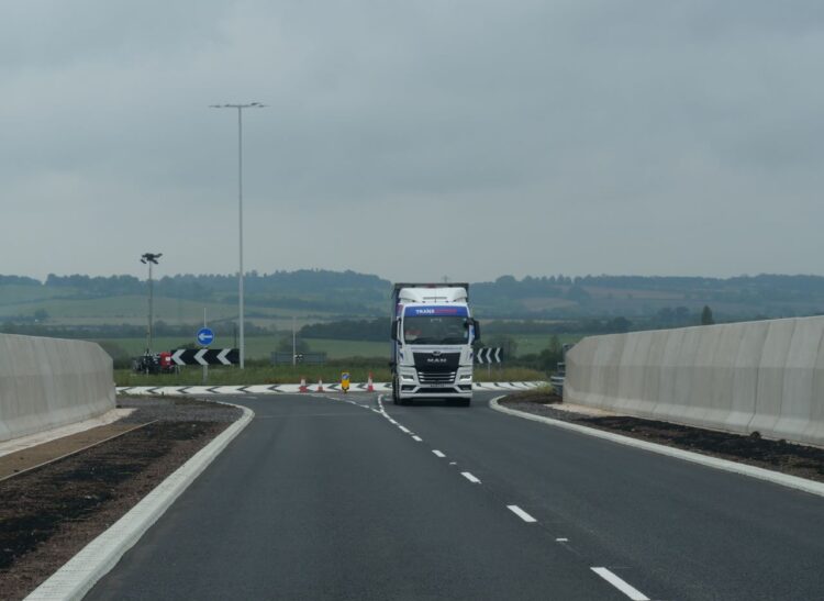 Vehicle driving over the newly opened A41 bridge near Waddesdon - HS2