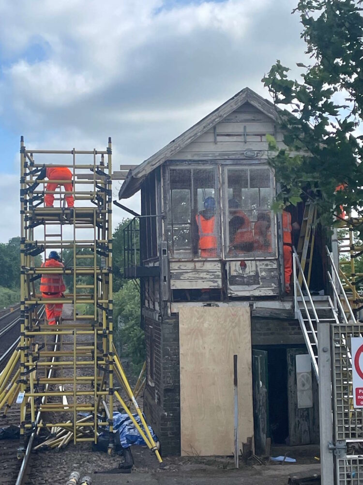 Stripping  the roof from Wye signal box. // Credit: Network Rail