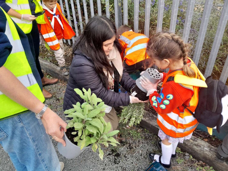 Squirrels planting the in the painted planters. // Credit: Greater Anglia