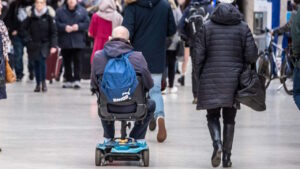 Passenger with mobility scooter