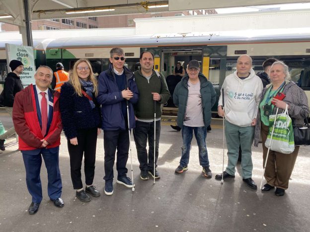 A group trialling the Aira app at Sutton station. // Credit: Govia Thameslink Railway