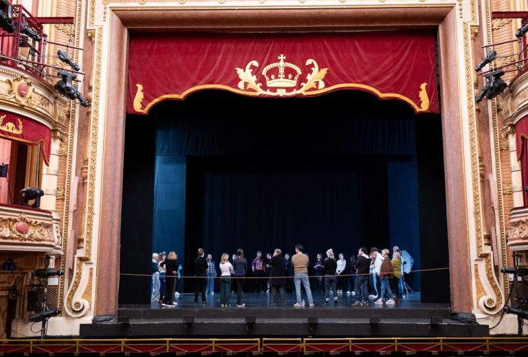 Students from St John Henry Newman College in Carlisle on stage at the King's Theatre in Glasgow.