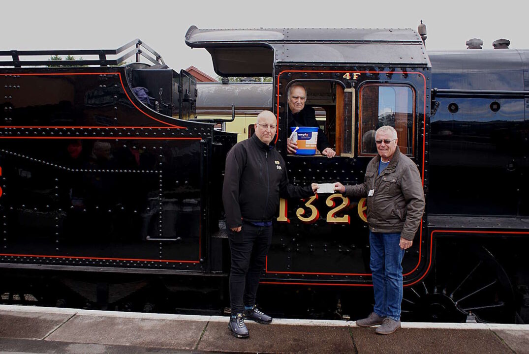 SVR managing director Jonathan 'Gus' Dunster, volunteer driver Rod Derry and Phil Clayton of the MNDA.