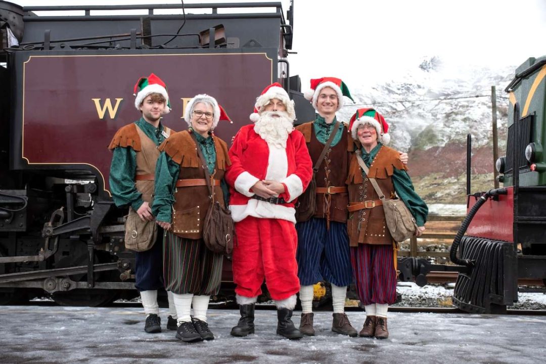 Santa and his elves pose on the Welsh Highland Railway
