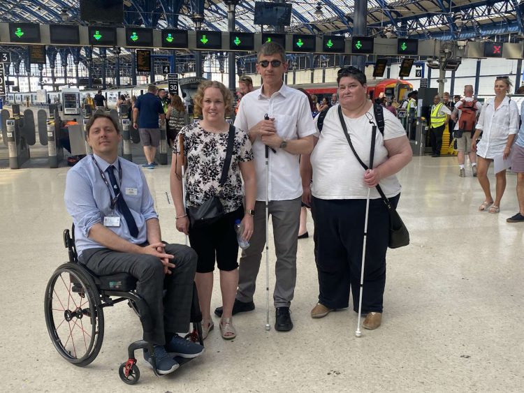 A group trialling the Aira app at Brighton station. // Credit: Govia Thameslink Railway