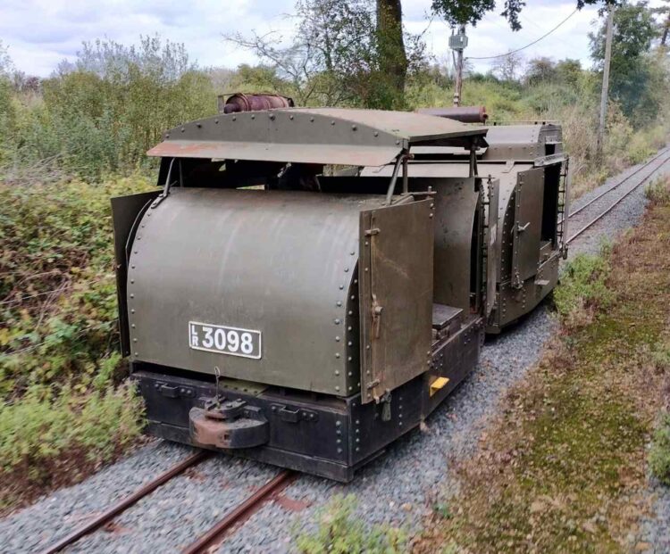 The two WW1 Simplex locomotives ‘Protected and Armoured' run alongside the service train on the demonstration line - Chris Grimes