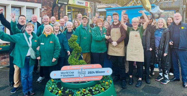 Staff and volunteers celebrate Maghull's victory in 2024's World Cup of Stations.