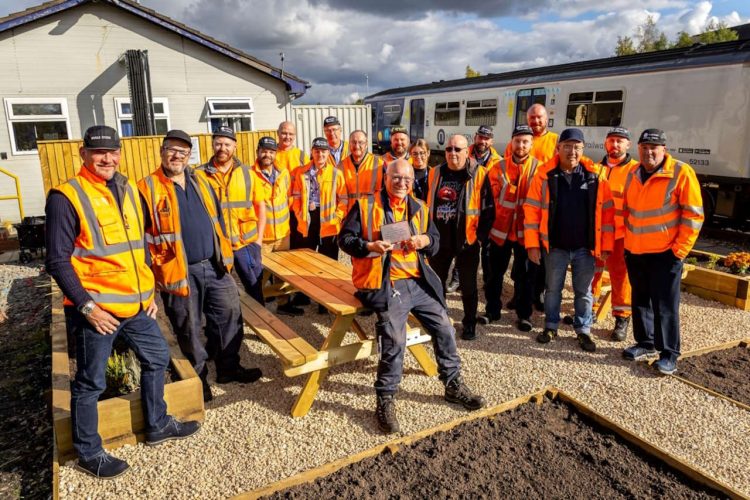 Mike Hughes with colleagues at his 50 years service celebration. // Credit: Northern