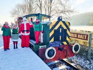 Father Christmas and his elves at Fimber during his 2023 visit. // Credit: Yorkshire Wolds Railway