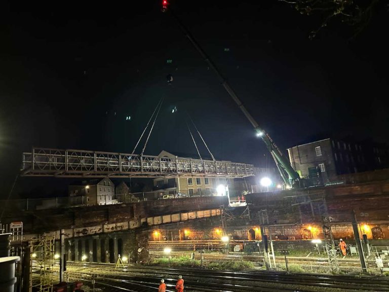 Engineers putting in a temporary footbridge at Agar Grove in Camden - Network Rail