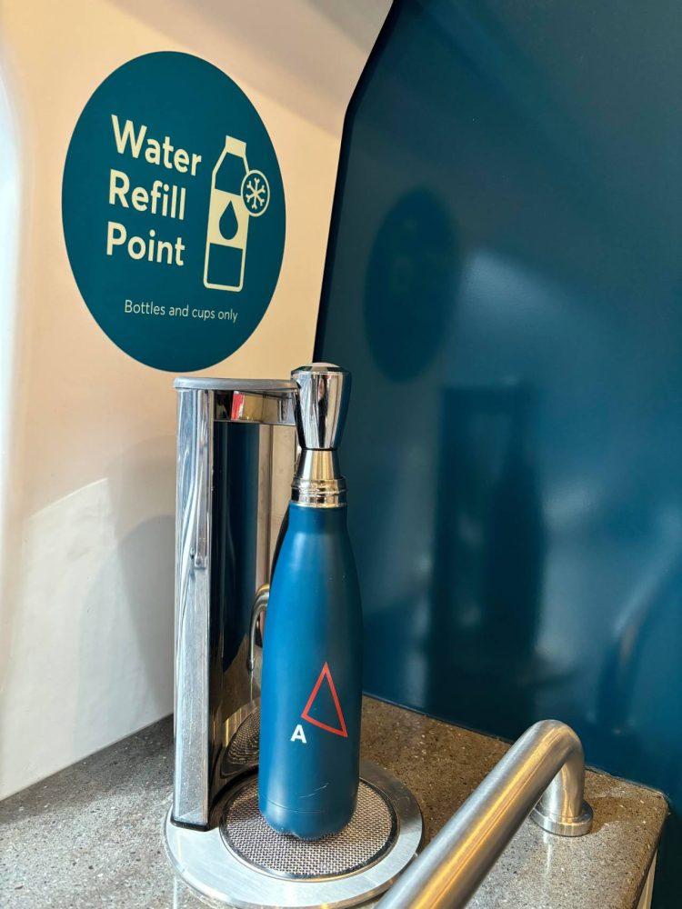 Water refill point with bottle