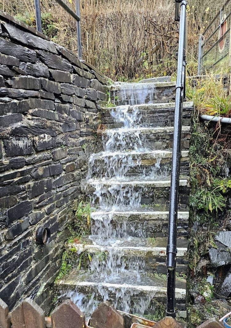 Water flooding onto the railway. // Credit: Corris Railway