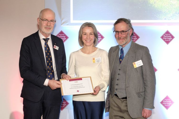 Andy Savage MBE  presenting the ward to Kerry Fieldhouse and Martyn Cannings for the Rail Motor Hut project - NYMR