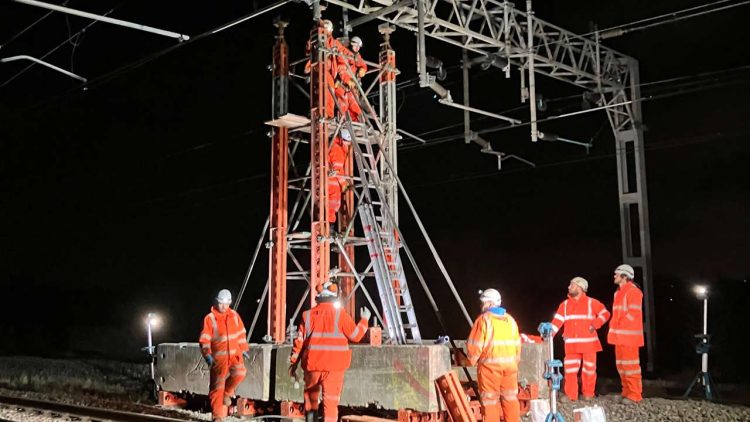 Engineers repairing the damaged overhead line structure at Polesworth. // Credit: Network Rail