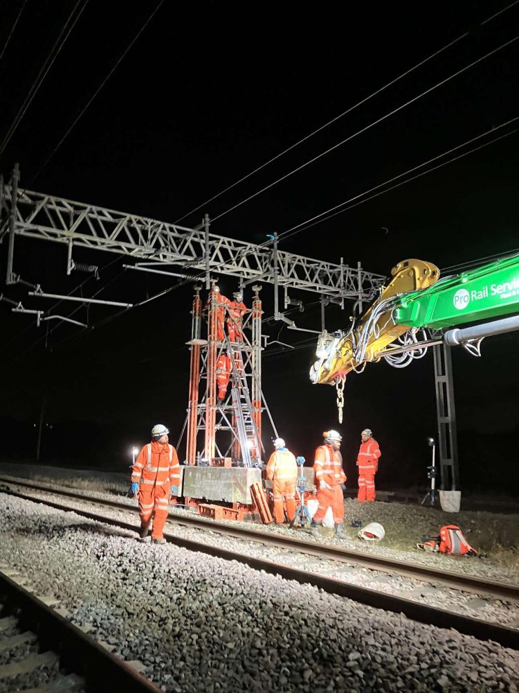 Engineers repairing the damaged overhead line structure atP olesworth. // Credit: Network Rail