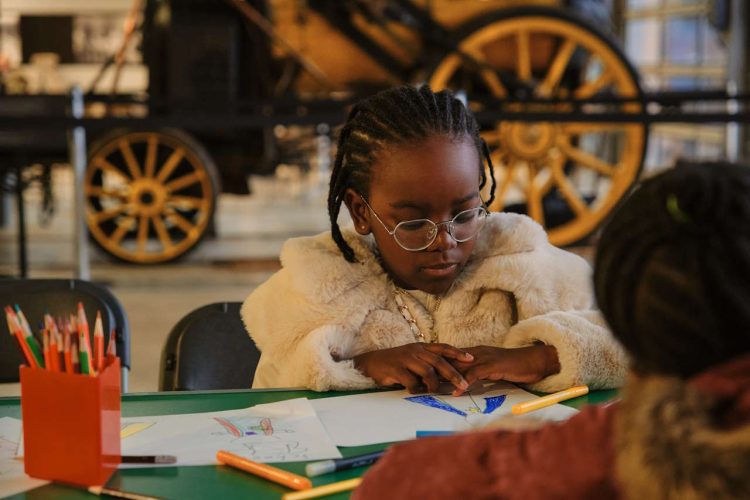 Young designer preparing their LNER art competition entries. //Credit: London North Eastern Railway