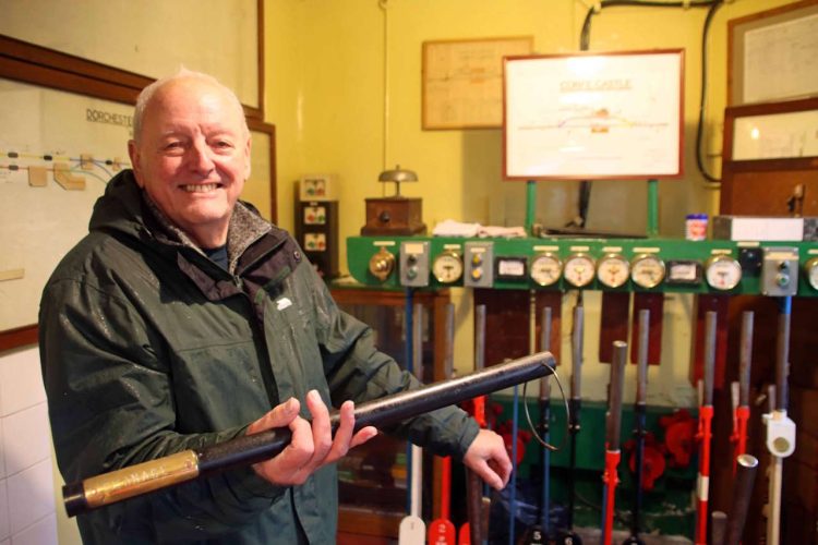 Signalman Bob Richards in Corfe Castle signal box. // Credit: Andrew P.W. Wright